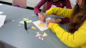 Girls playing a Tangrams game in a focus group run as part of the StoryTeach project.